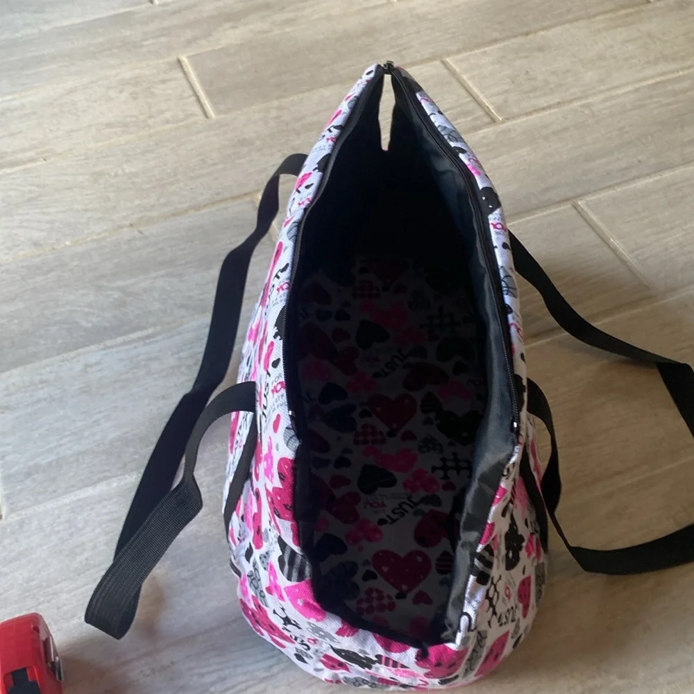 Pet Carrier.10.5”tall x 20”wide x 9”Deep. Long straps. Removable bottom. Zipper